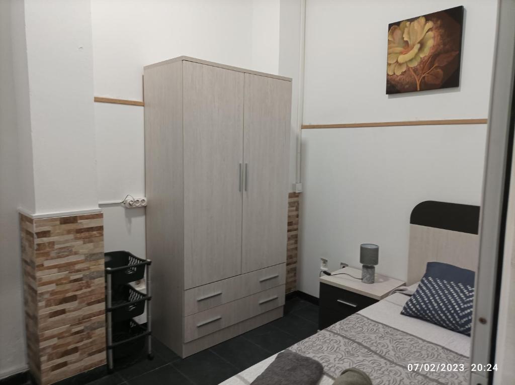 Postel nebo postele na pokoji v ubytování Casa La Isleta, entre el puerto y la playa Las Canteras