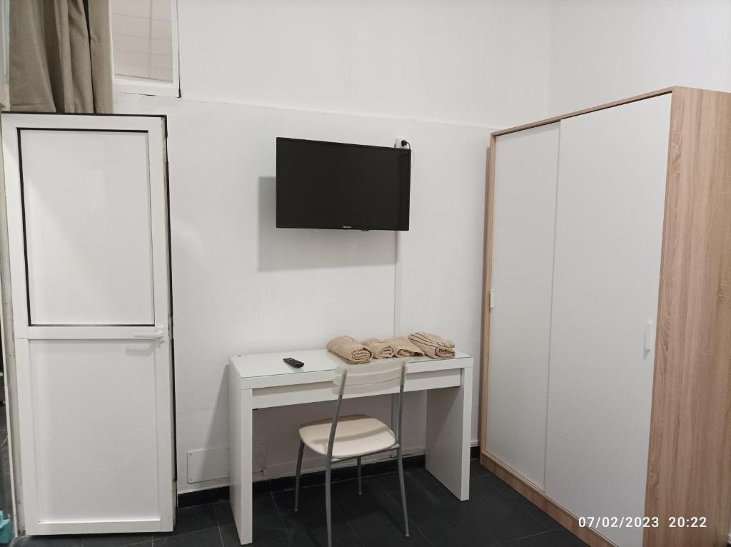 TV a/nebo společenská místnost v ubytování Casa La Isleta, entre el puerto y la playa Las Canteras