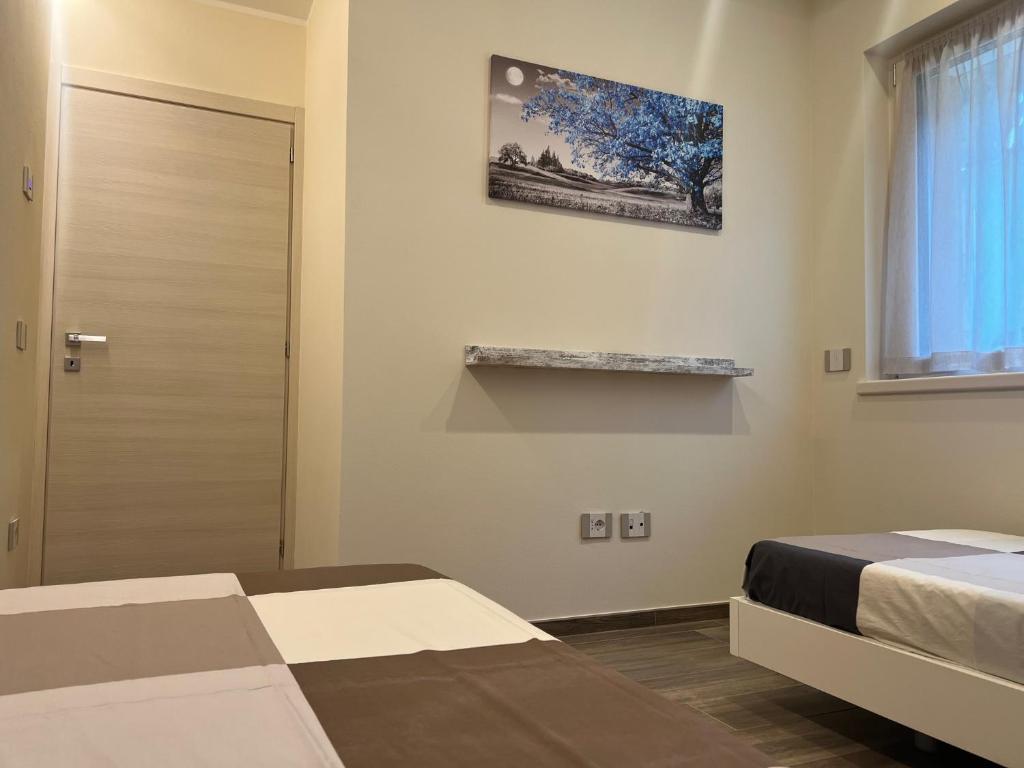 Postel nebo postele na pokoji v ubytování Appartamento Monte
