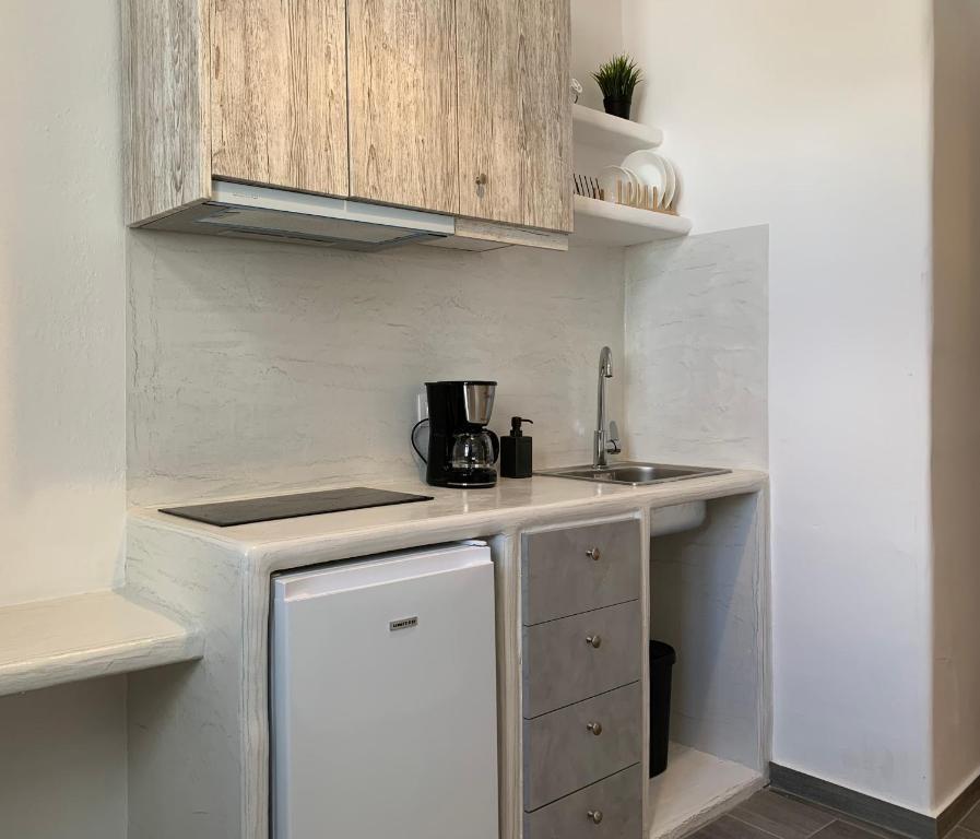 Kuchyň nebo kuchyňský kout v ubytování Juli’s Suites