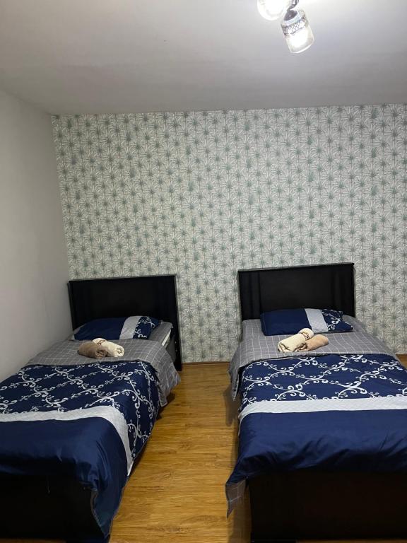 Postel nebo postele na pokoji v ubytování Guest House Zatika