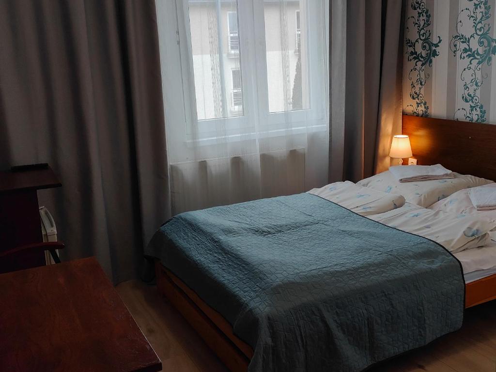 Łóżko lub łóżka w pokoju w obiekcie Villa Park Maikuhle