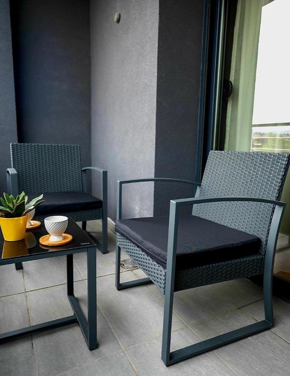 Ein Sitzbereich in der Unterkunft Apartment Leona