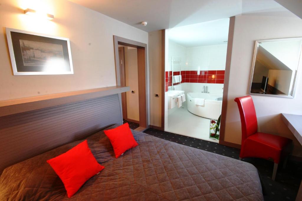 Postel nebo postele na pokoji v ubytování Garni Hotel Leopold I