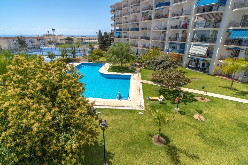 Výhled na bazén z ubytování Almijara Apartments Casasol nebo okolí