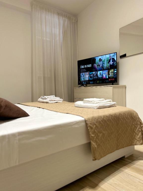A bed or beds in a room at NEWHOUSE ROOFTOP - Super Penthouse Seaview
