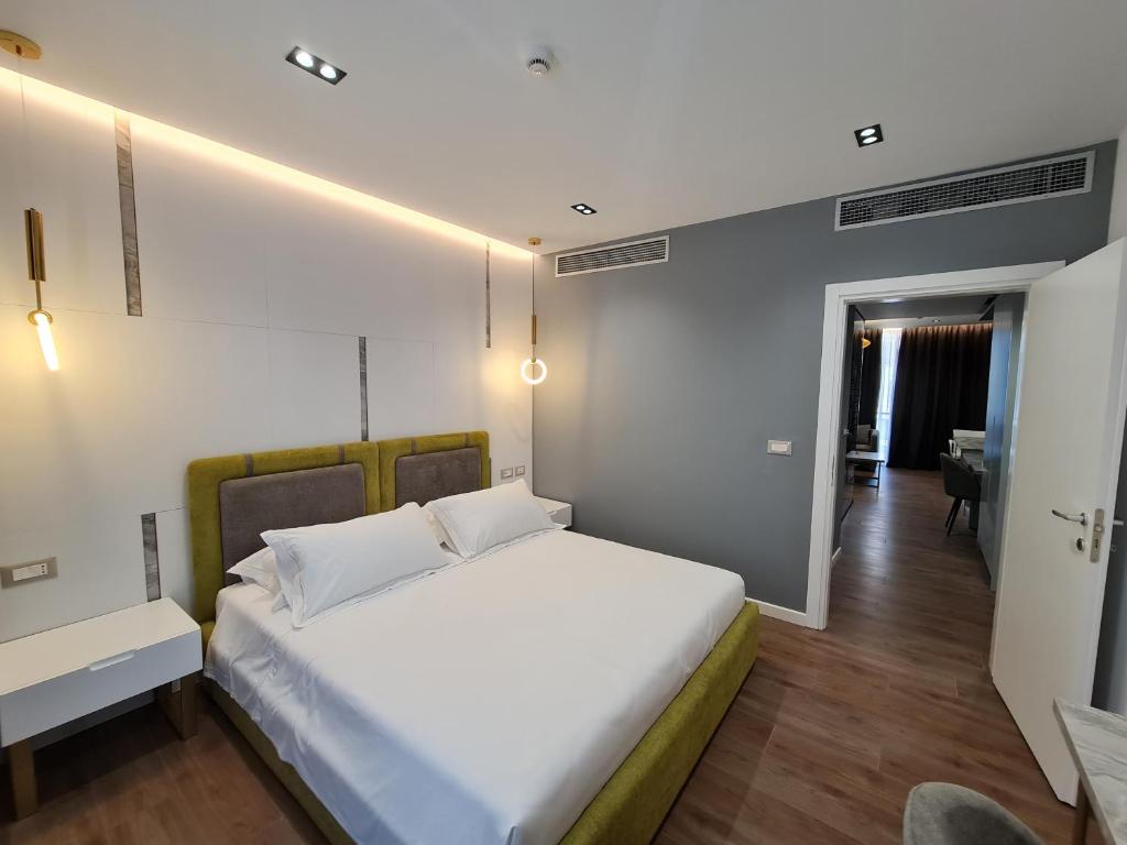 Postel nebo postele na pokoji v ubytování Regina City Hotel & SPA