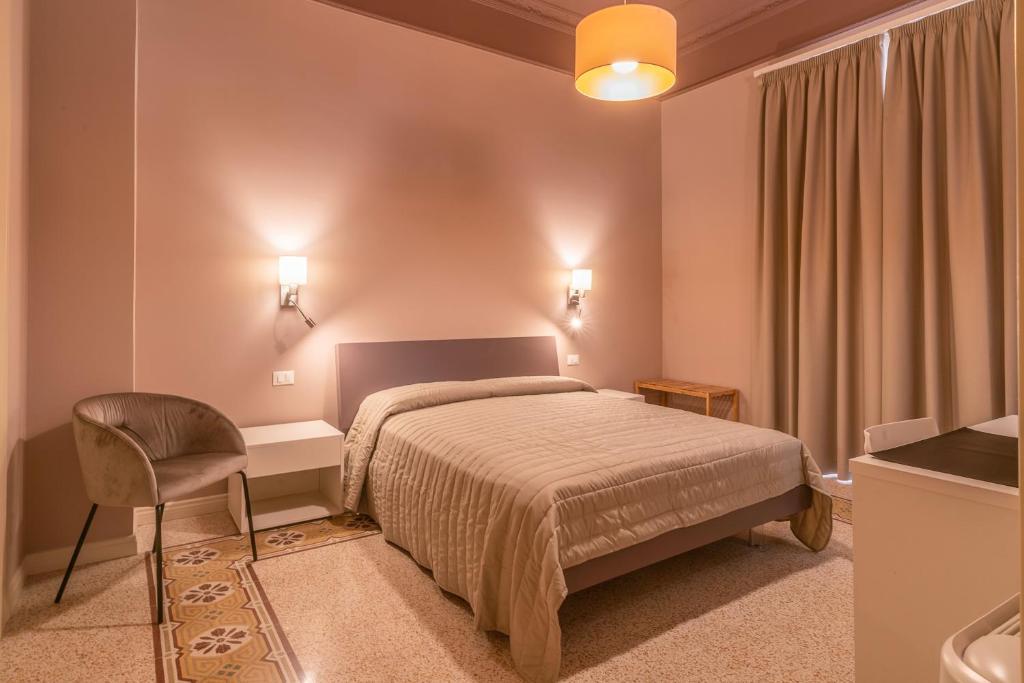 Postel nebo postele na pokoji v ubytování B&B Handy Palermo