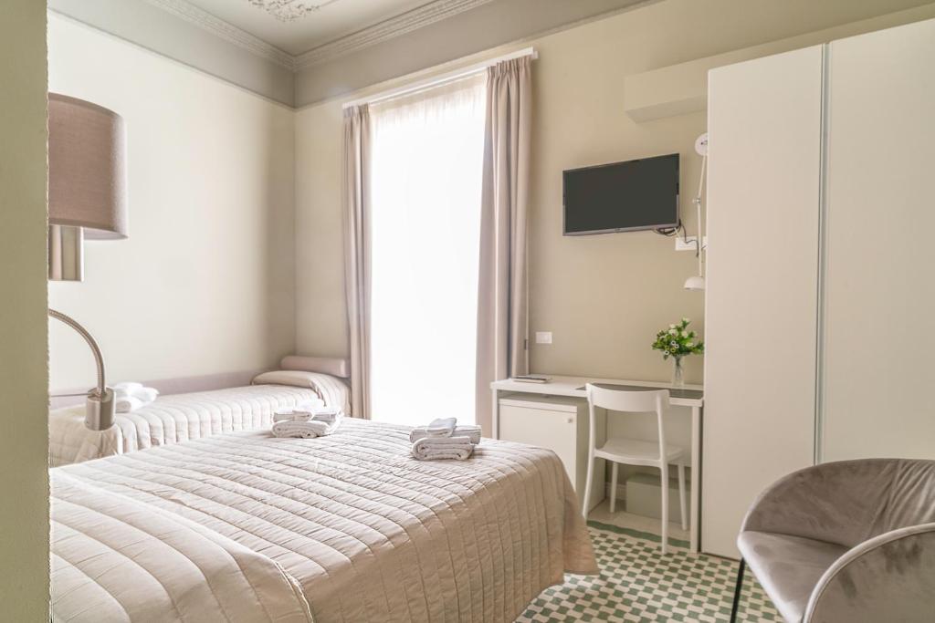 Postel nebo postele na pokoji v ubytování B&B Handy Palermo