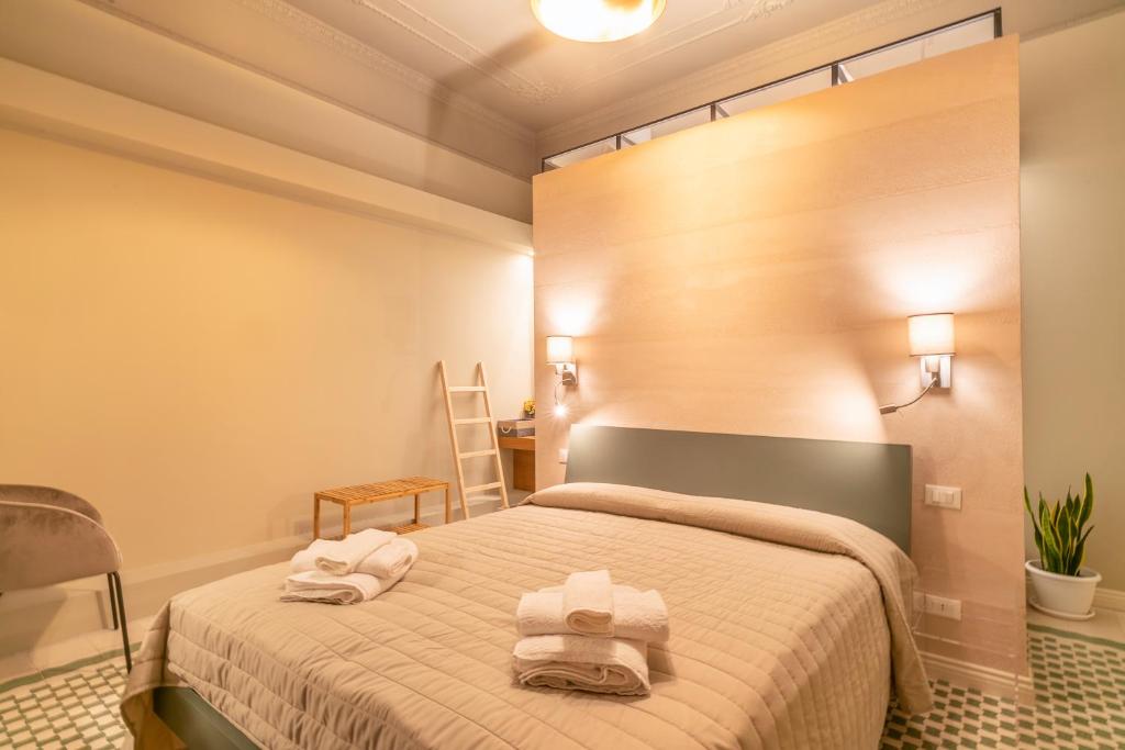 Postel nebo postele na pokoji v ubytování B&B Handy Palermo