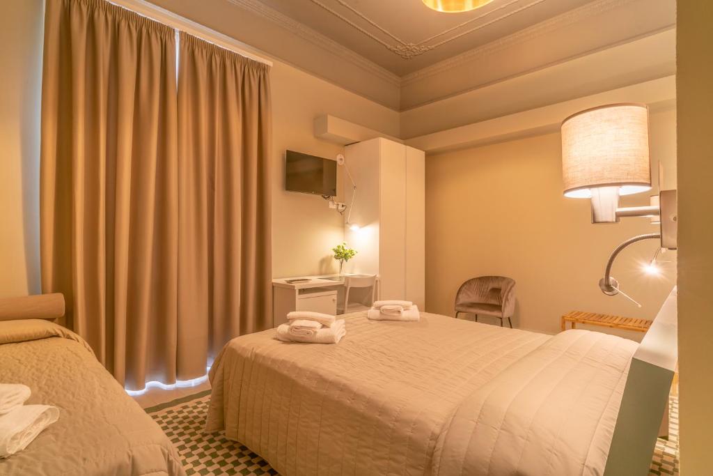 Postel nebo postele na pokoji v ubytování B&B Handy Palermo