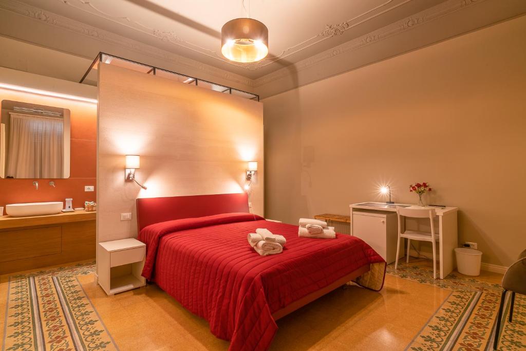 Postel nebo postele na pokoji v ubytování B&B Handy Palermo