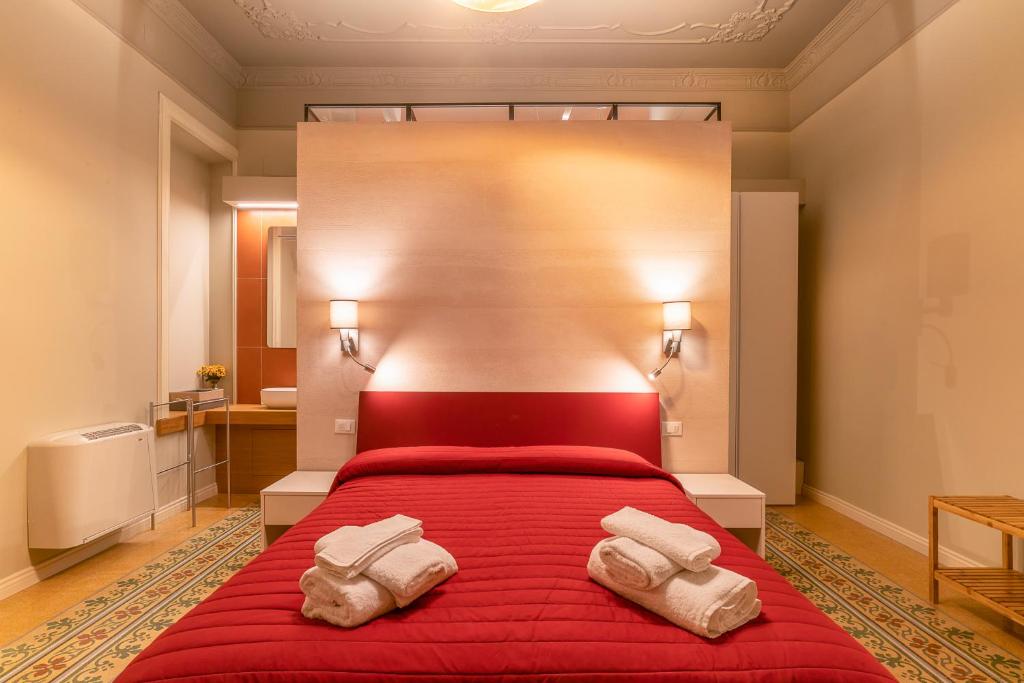 Postel nebo postele na pokoji v ubytování B&B Handy Palermo