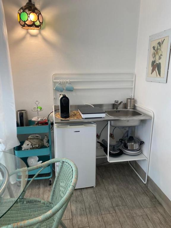 Kuchyň nebo kuchyňský kout v ubytování Riad Rooms