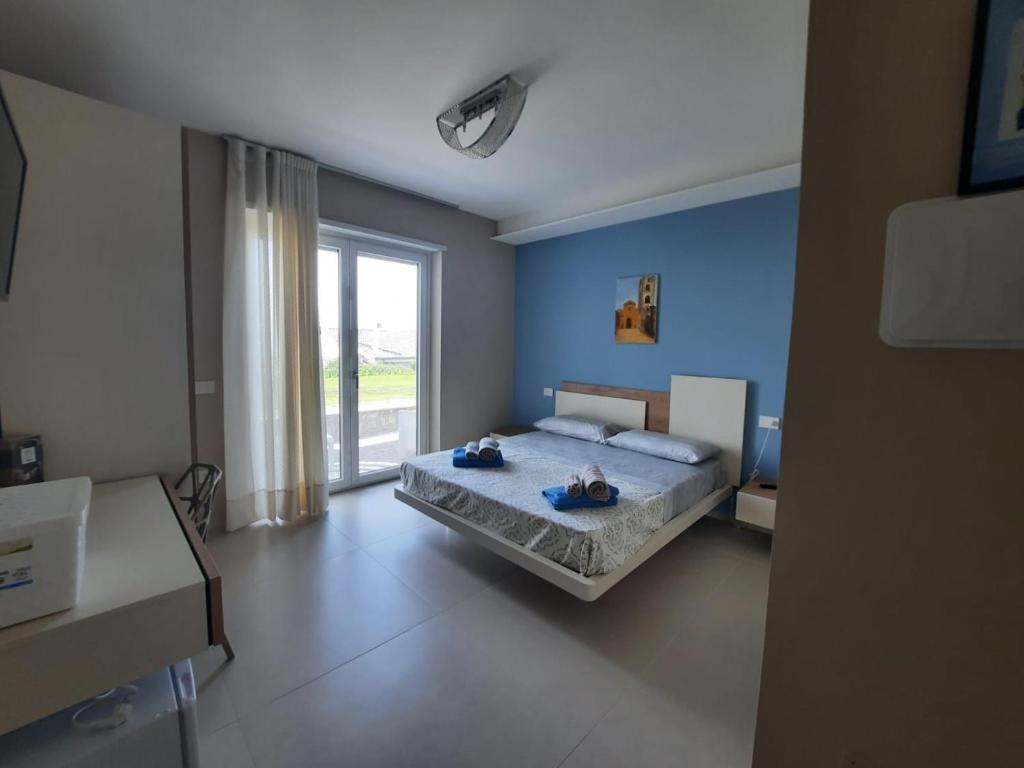 A bed or beds in a room at Gaetammare