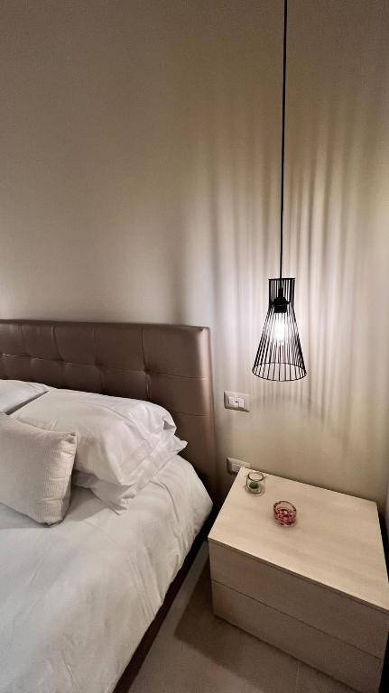 A bed or beds in a room at Casa Adriana