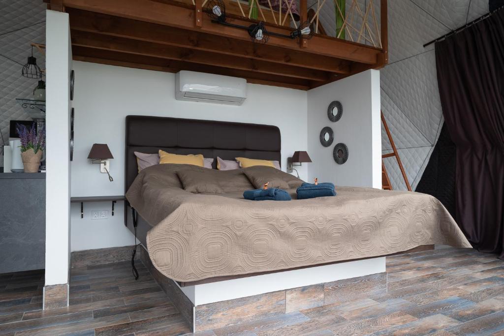Postel nebo postele na pokoji v ubytování Mecsek Szíve Glamping
