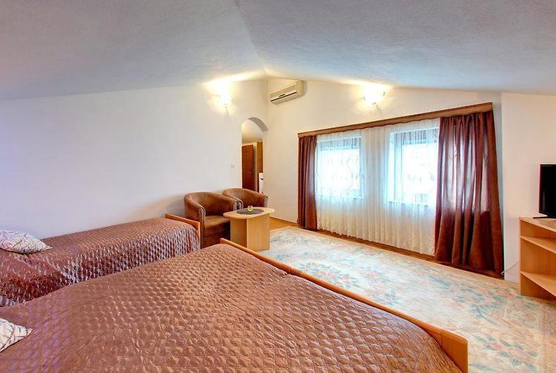 Postel nebo postele na pokoji v ubytování Apartments Stari most