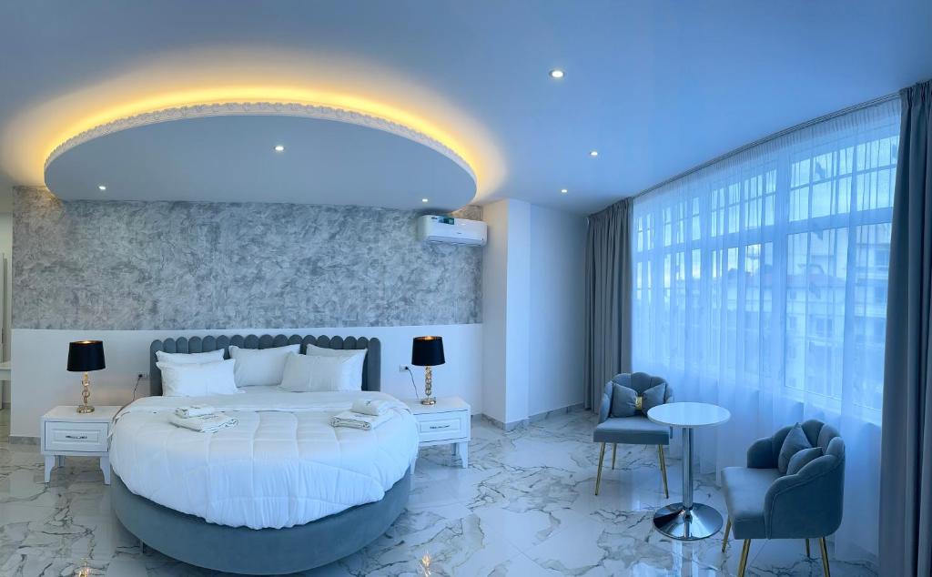 Posteľ alebo postele v izbe v ubytovaní UJVARA HOTEL