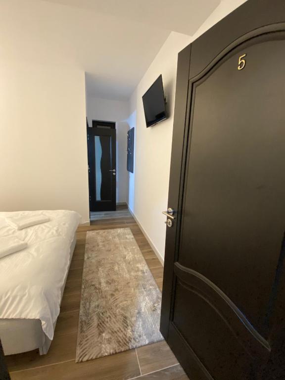 Postel nebo postele na pokoji v ubytování MODERN House