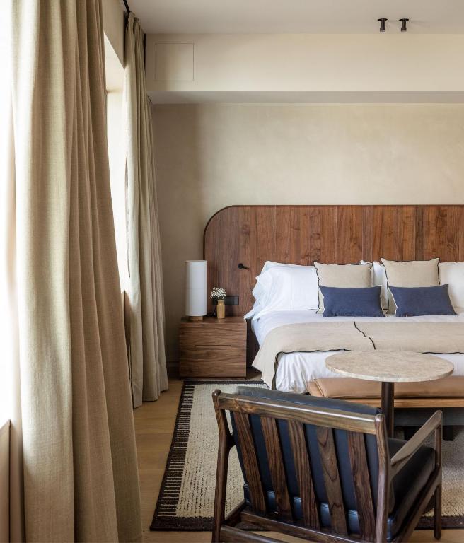 Postel nebo postele na pokoji v ubytování Hotel Ur Bare