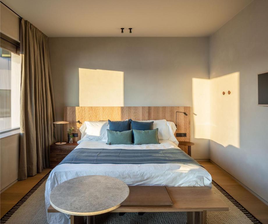 Postel nebo postele na pokoji v ubytování Hotel Ur Bare