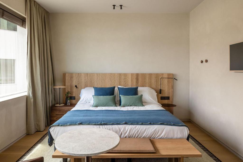 Postel nebo postele na pokoji v ubytování Hotel Ur Bare