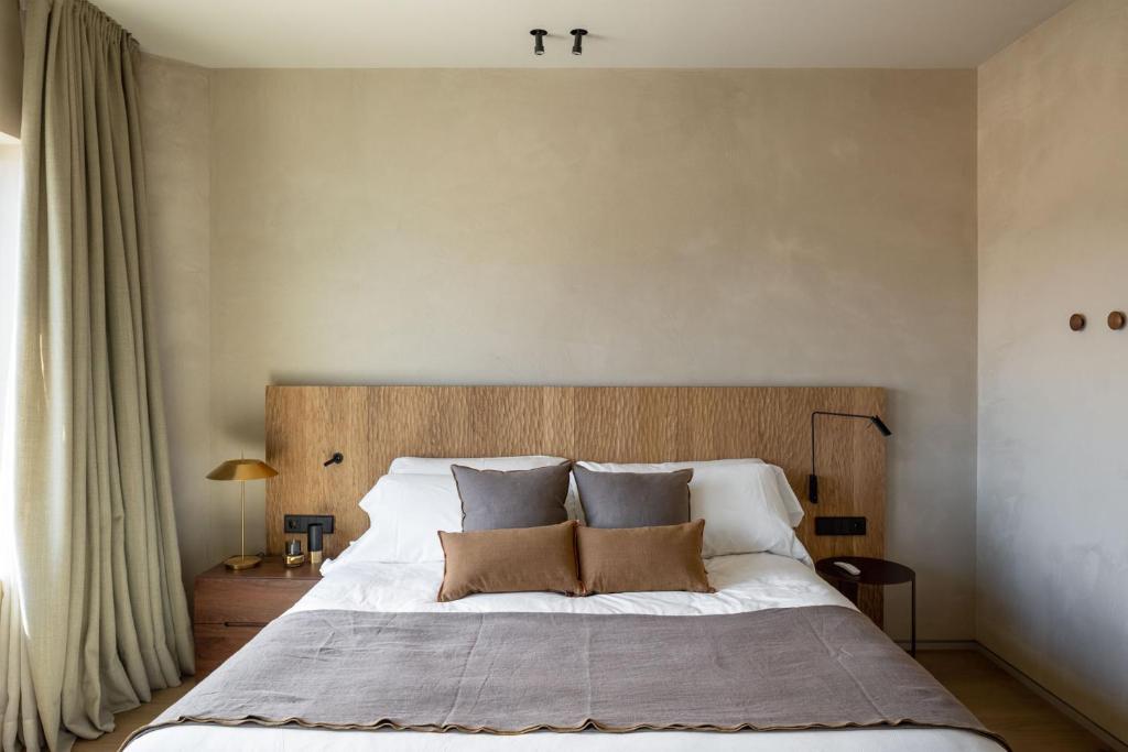 Postel nebo postele na pokoji v ubytování Hotel Ur Bare