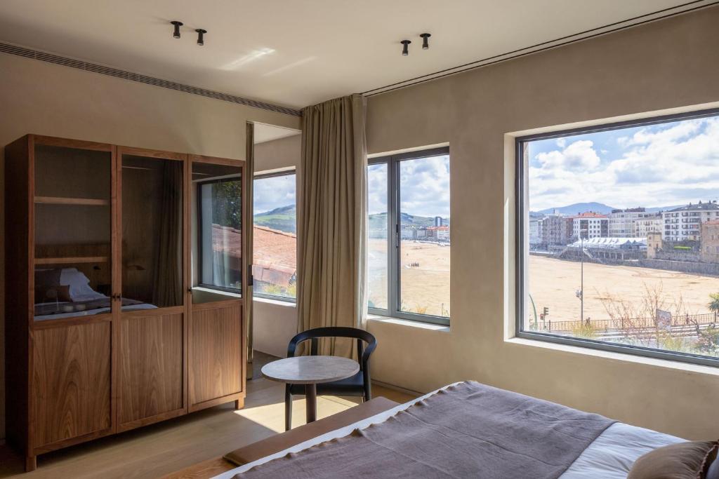 Postel nebo postele na pokoji v ubytování Hotel Ur Bare