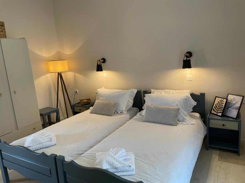 Postel nebo postele na pokoji v ubytování Villa Sandra