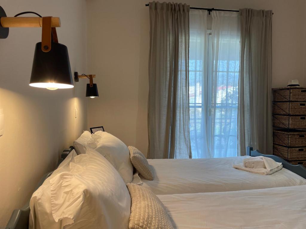 Postel nebo postele na pokoji v ubytování Villa Sandra