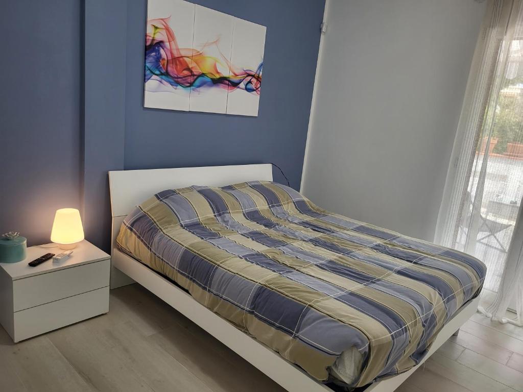 Łóżko lub łóżka w pokoju w obiekcie Casa sul Mare Formia Con una Splendida Terrazza