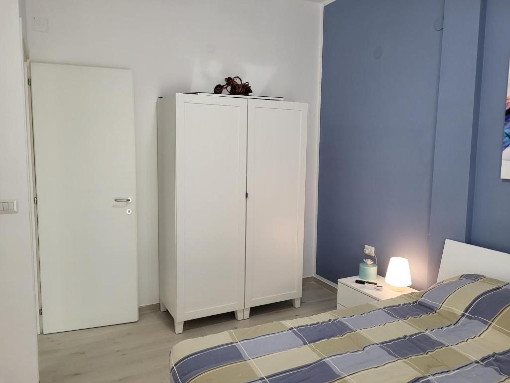 Łóżko lub łóżka w pokoju w obiekcie Casa sul Mare Formia Con una Splendida Terrazza