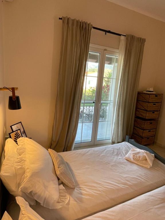 Postel nebo postele na pokoji v ubytování Villa Sandra