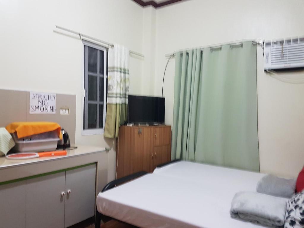 Postel nebo postele na pokoji v ubytování JZA Transient House