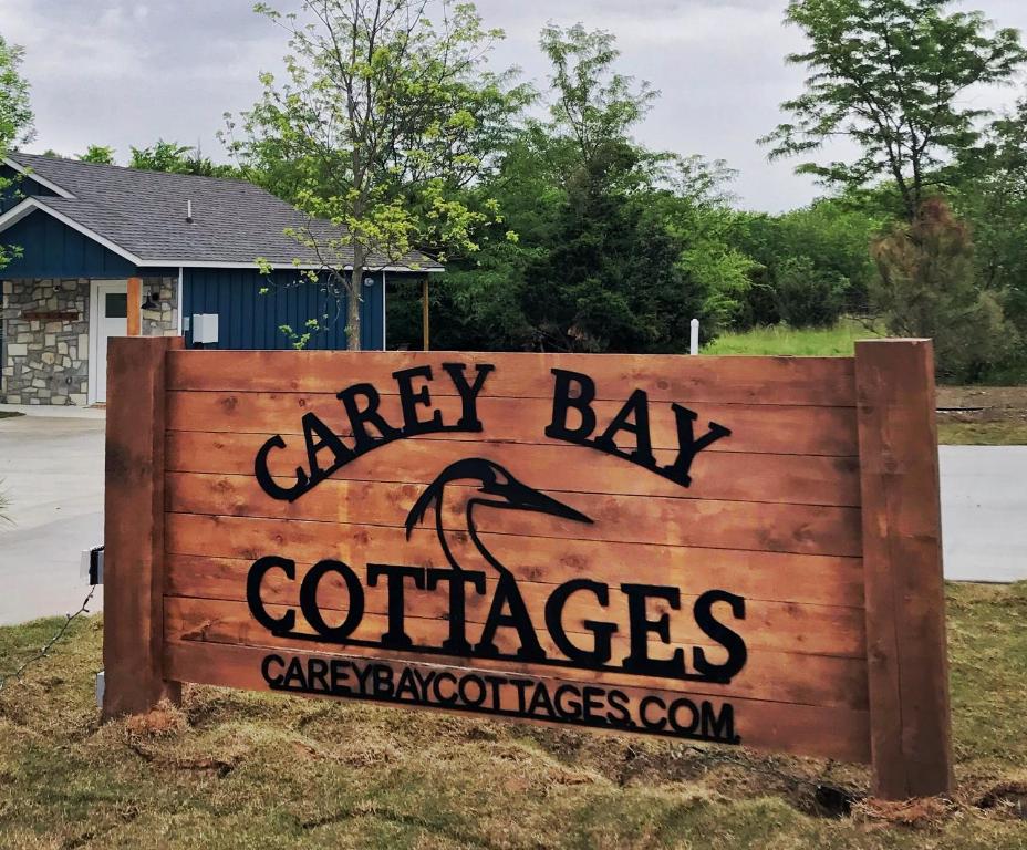a sign for a cayley bay coffees carver appliances at Carey Bay Cottages “A” in Grove