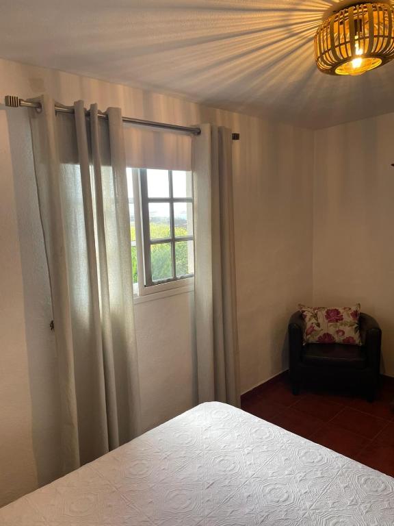 Postel nebo postele na pokoji v ubytování La Casita de la Breña.