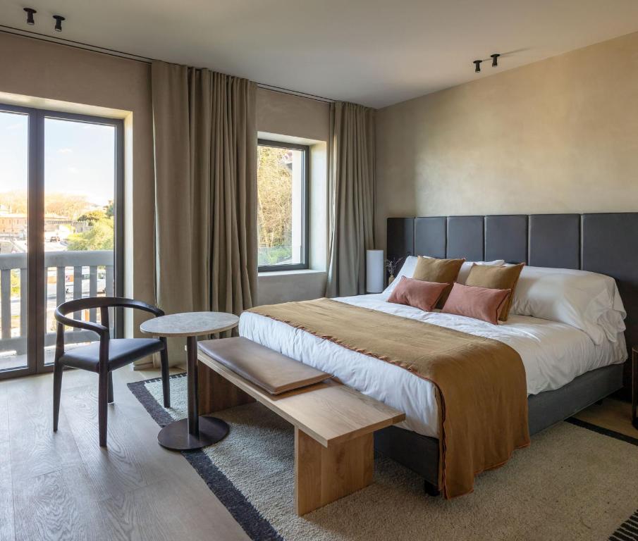 Postel nebo postele na pokoji v ubytování Hotel Ur Bare