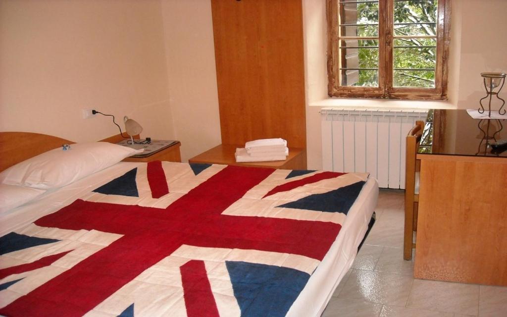 Postel nebo postele na pokoji v ubytování B&B Corte Bezzetti