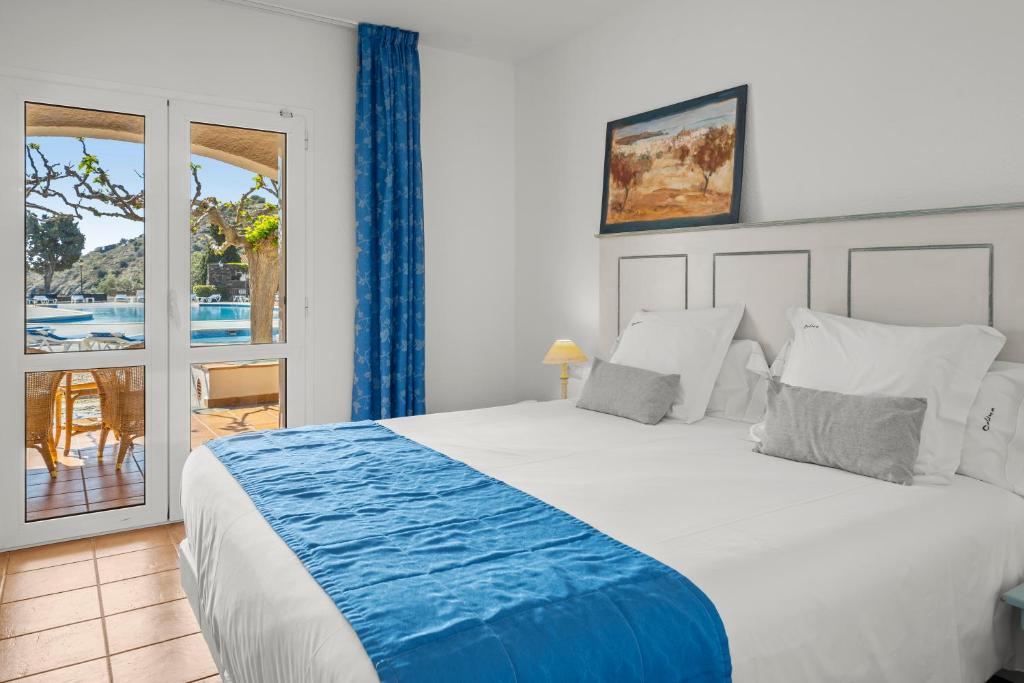 Postel nebo postele na pokoji v ubytování Hotel Calina