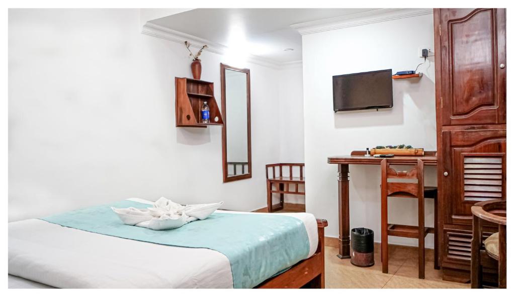 Postel nebo postele na pokoji v ubytování Hotel Mart View