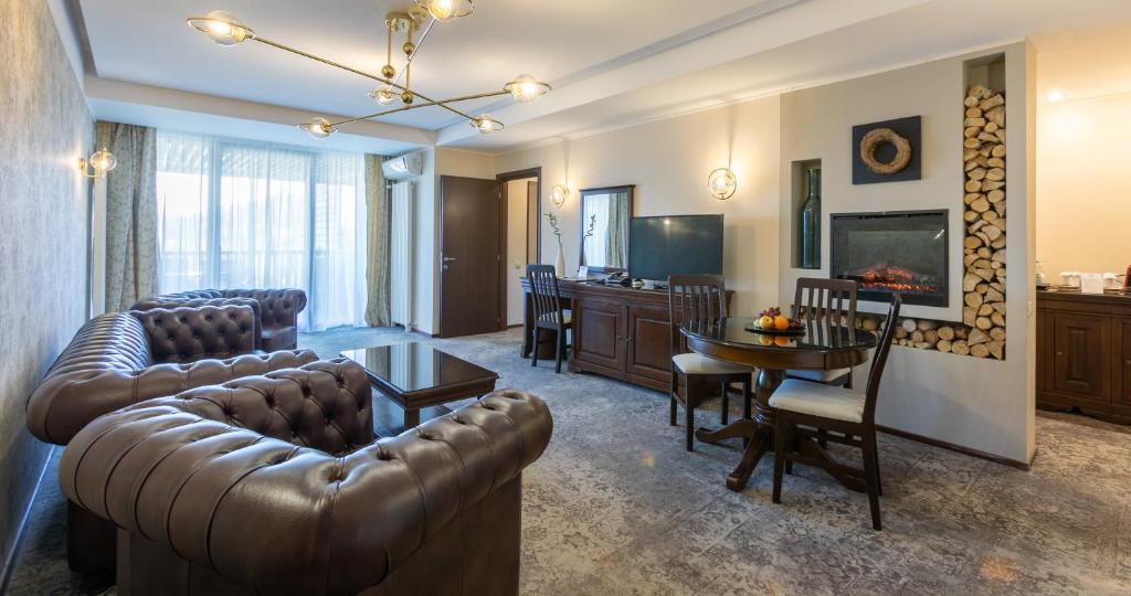 TV a/nebo společenská místnost v ubytování Alpin Resort Hotel