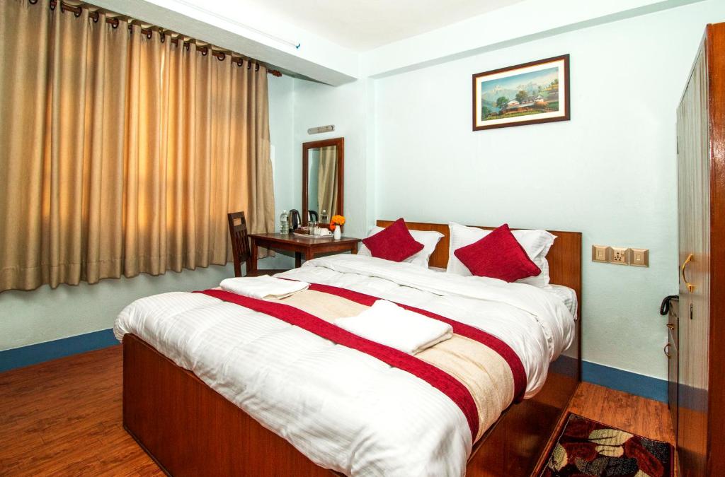 Postel nebo postele na pokoji v ubytování Thamel Eco Home