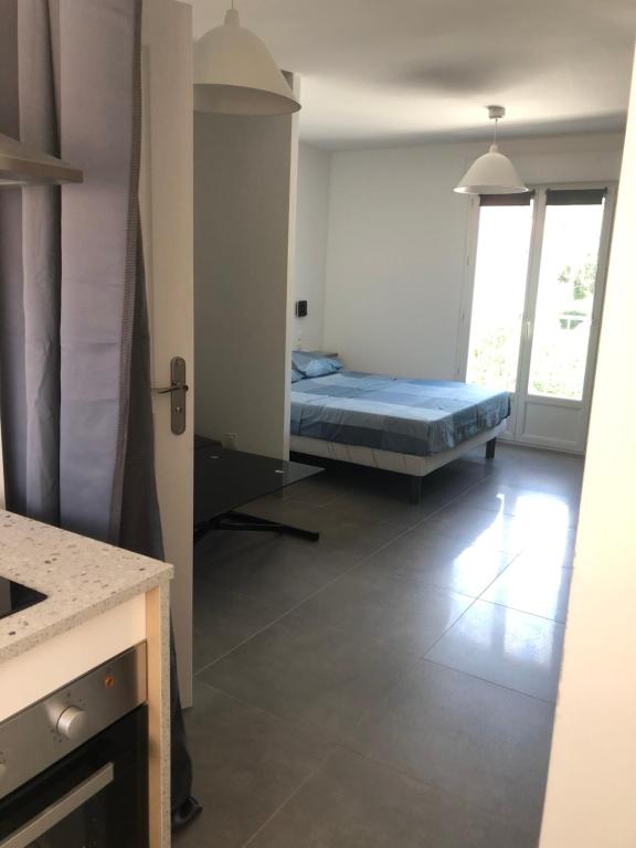 Posteľ alebo postele v izbe v ubytovaní LA VILLA NESSIRAH