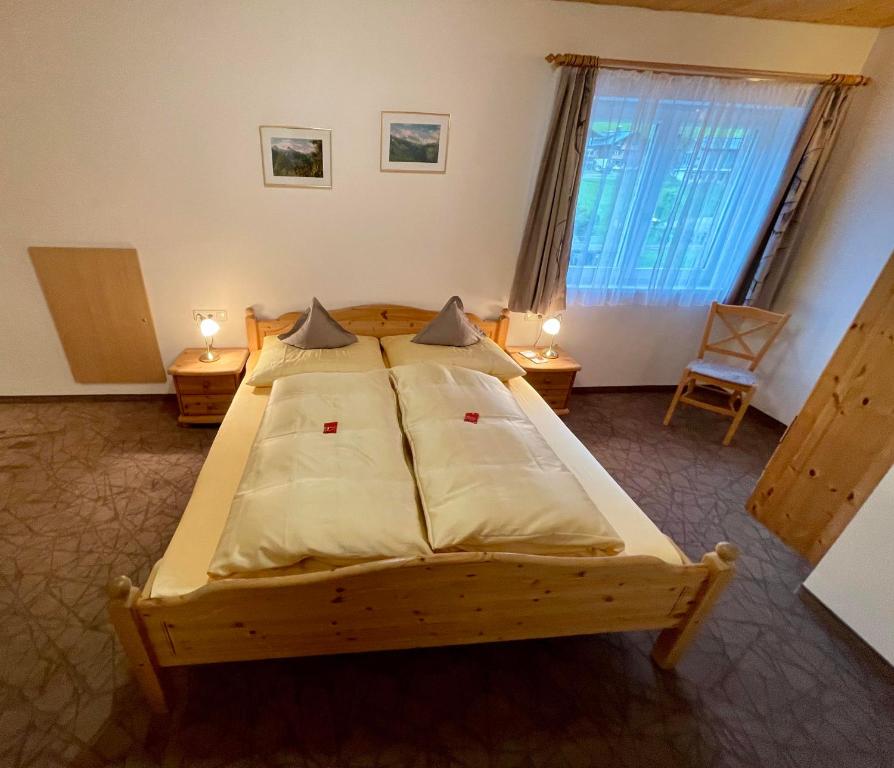 Postel nebo postele na pokoji v ubytování Haus Dagmar