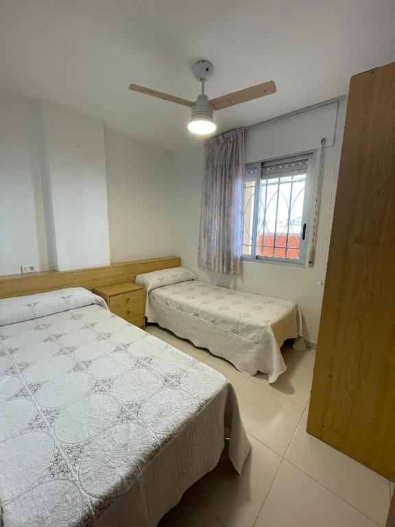 Postel nebo postele na pokoji v ubytování Alpen1 Europeñiscola