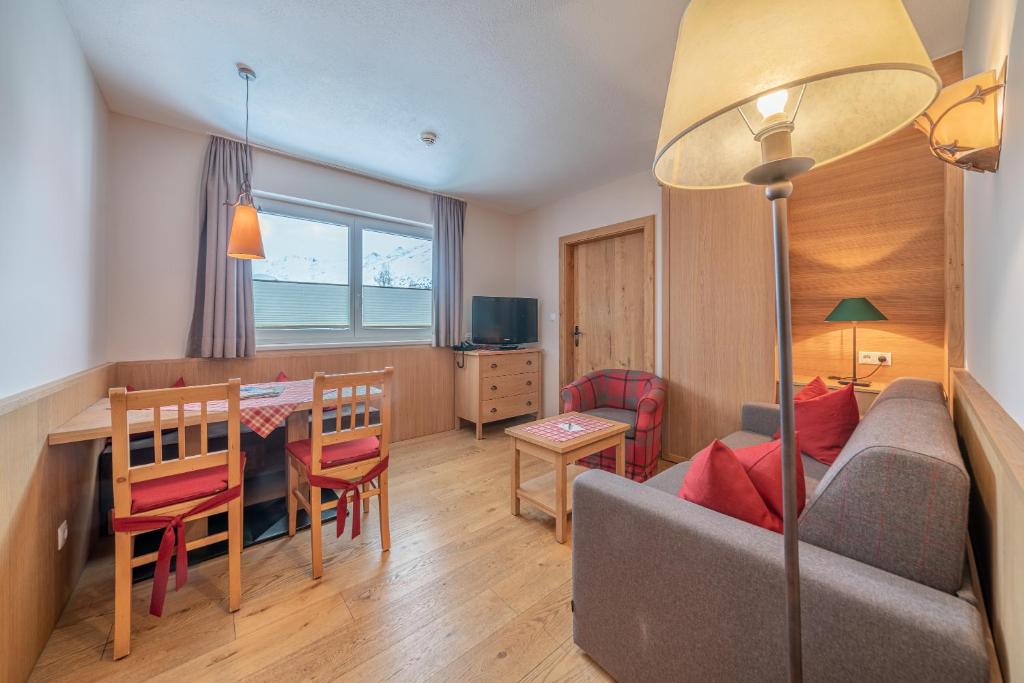 Posezení v ubytování Hotel Enzian & Apartmenthotel Johannes