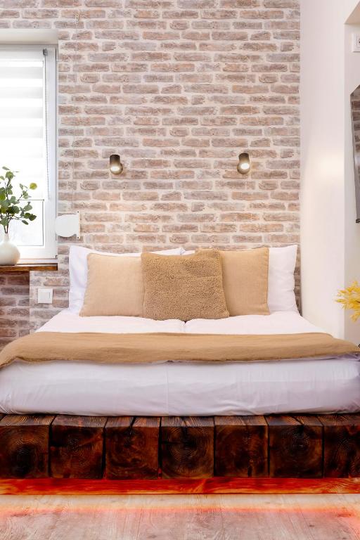 Posteľ alebo postele v izbe v ubytovaní WOW Apartment by Cozyplace