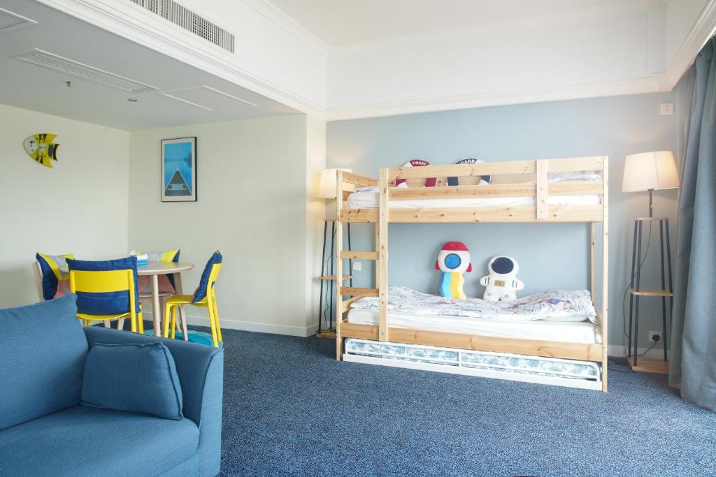Ein Bett oder Betten in einem Zimmer der Unterkunft Warwick Hotel Cheung Chau