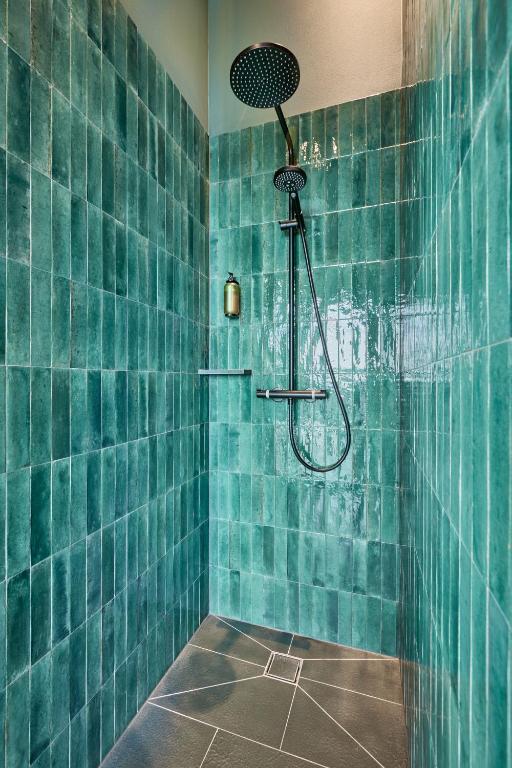 A bathroom at Floris Green Suites by Parc Hotel Florian